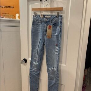 Levi’s Blue Skinny Jeans with Distressed Details
